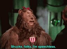 cowardly lion aw shucks gif.